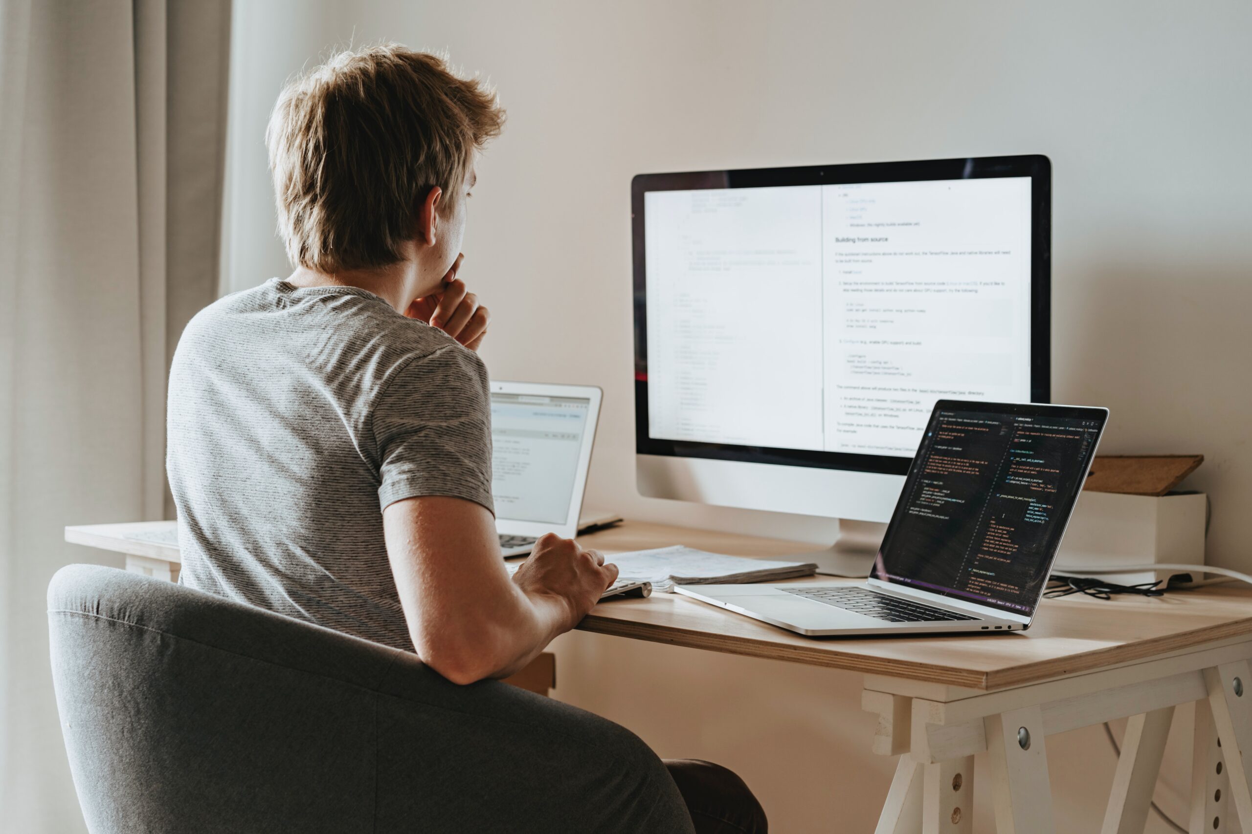 man staring at a computer