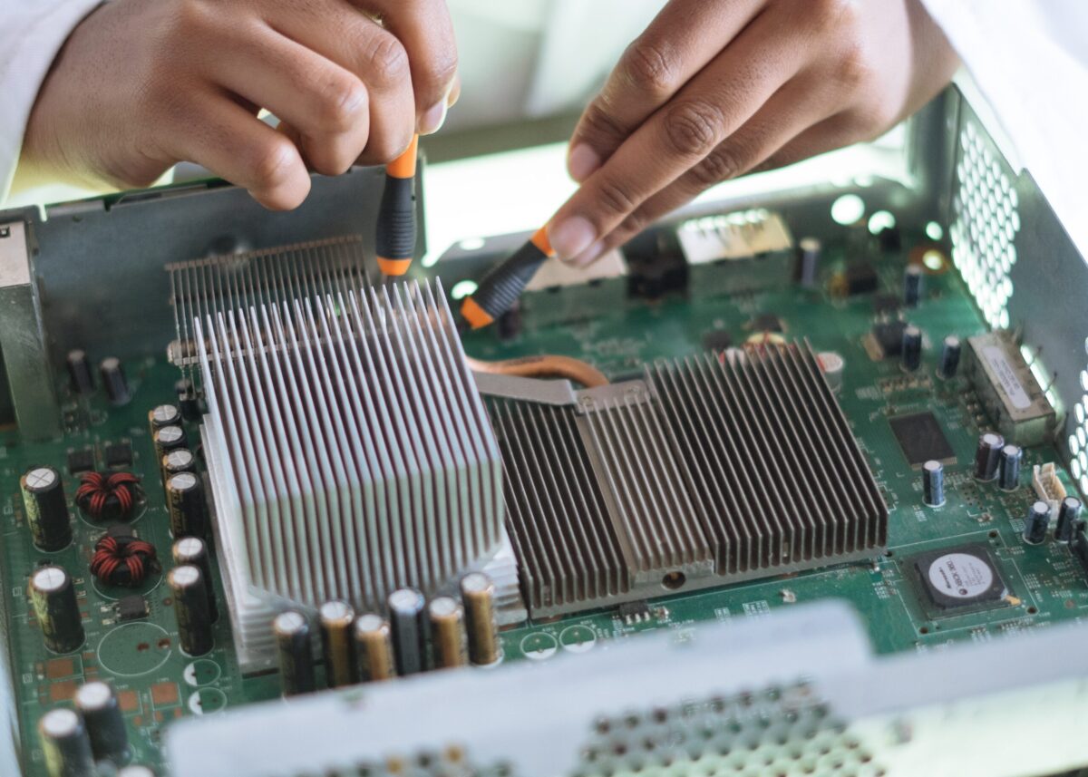 a person working on a computer board